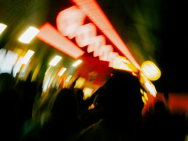 Neon signs blurred in motion