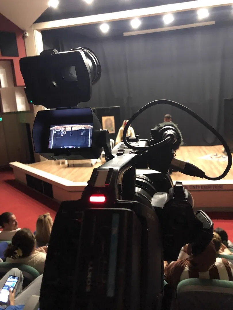 A broadcast camera in a television studio